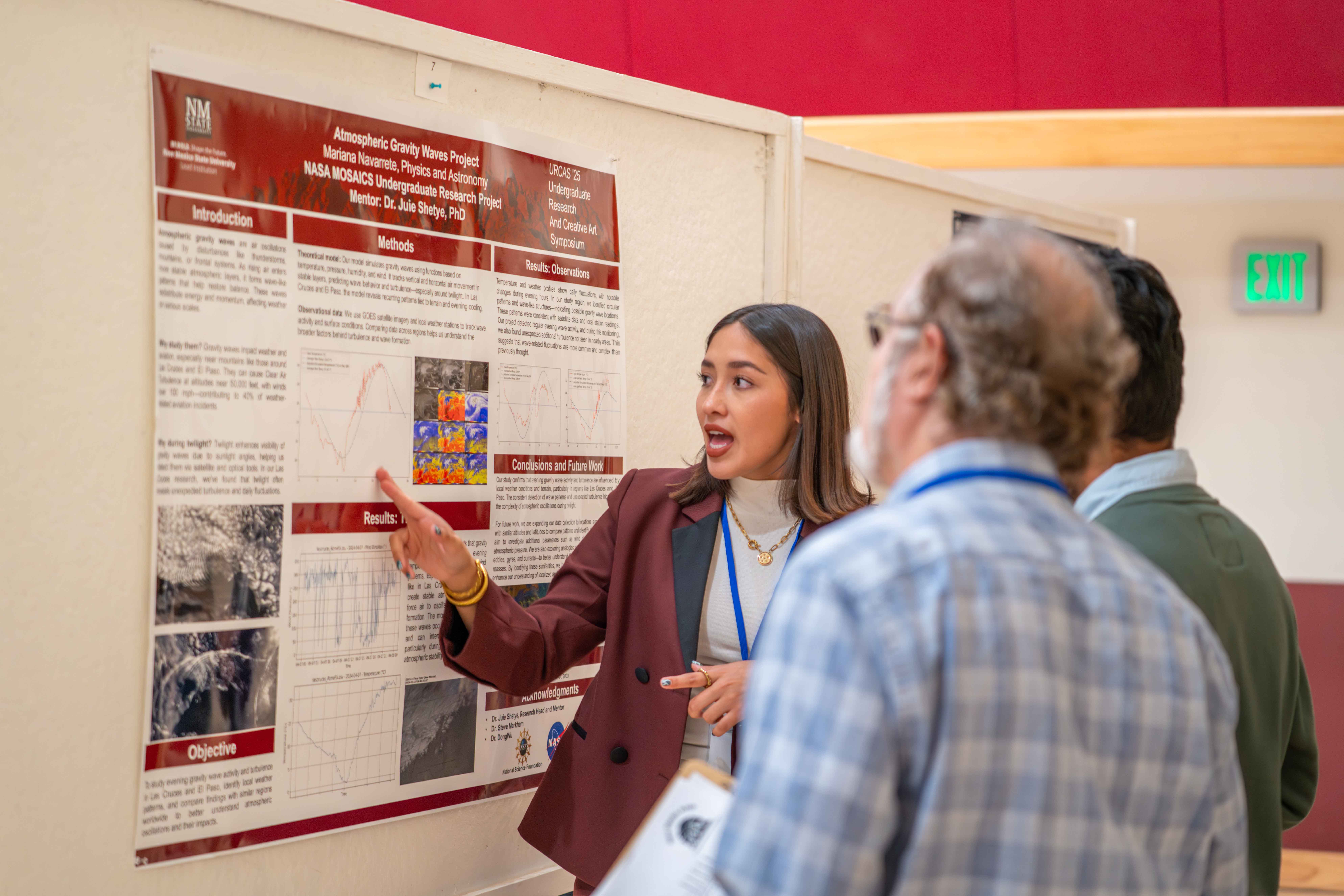 URS Student presenting their poster.